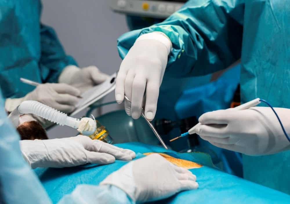 doctors doing surgical procedure patient