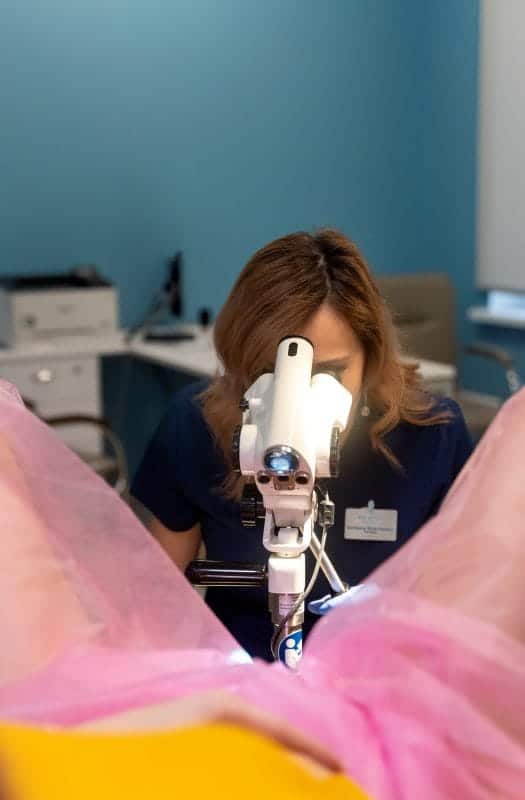 gynecologist performing consultation patient